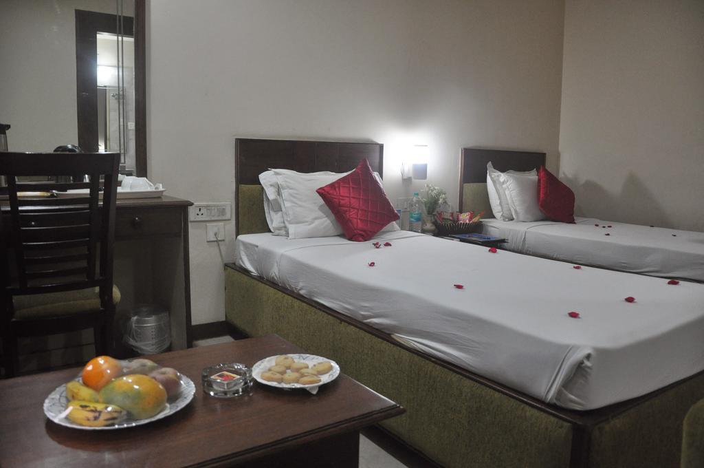 The Presidency Hotell Bhubaneswar Rom bilde